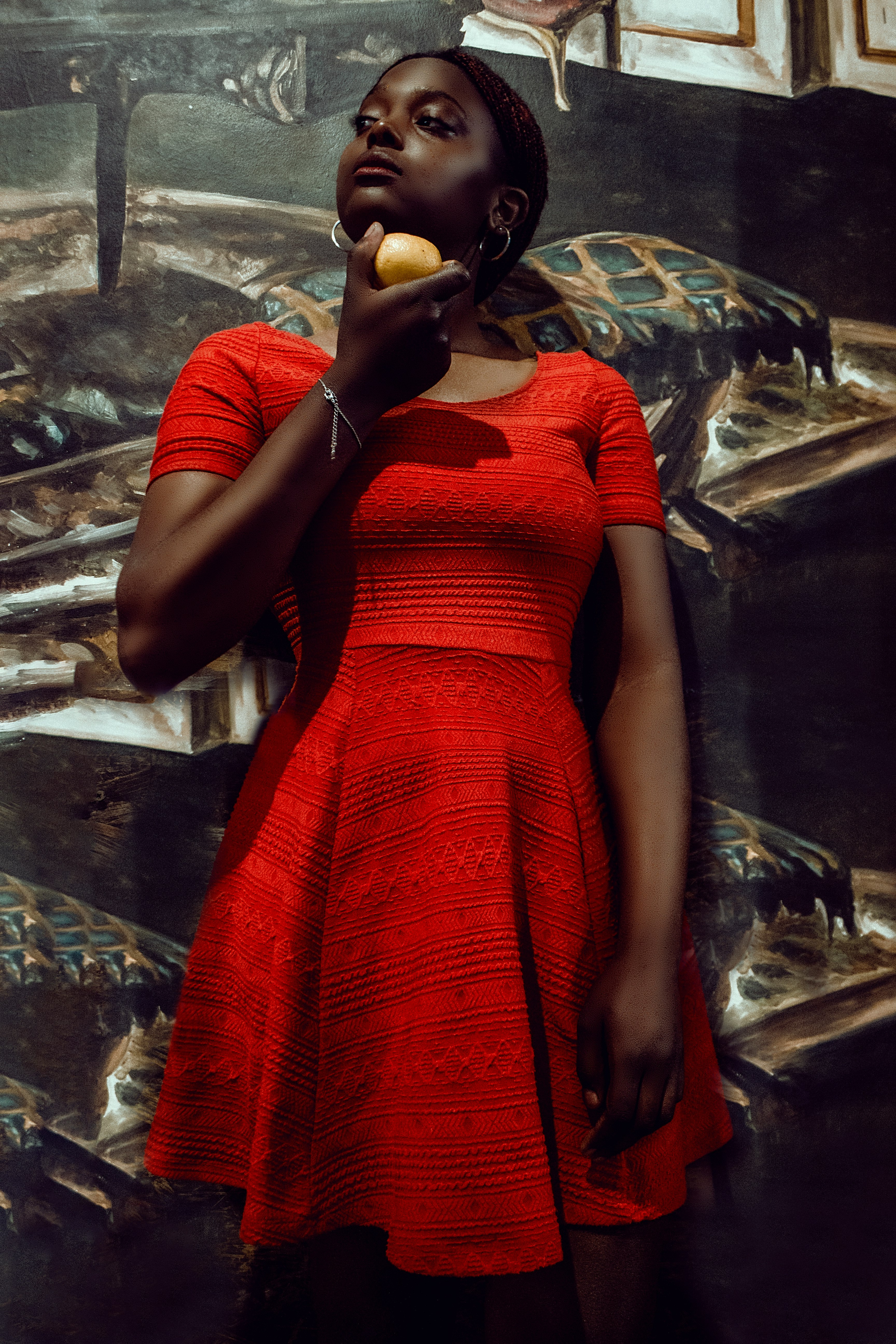 woman in red dress standing