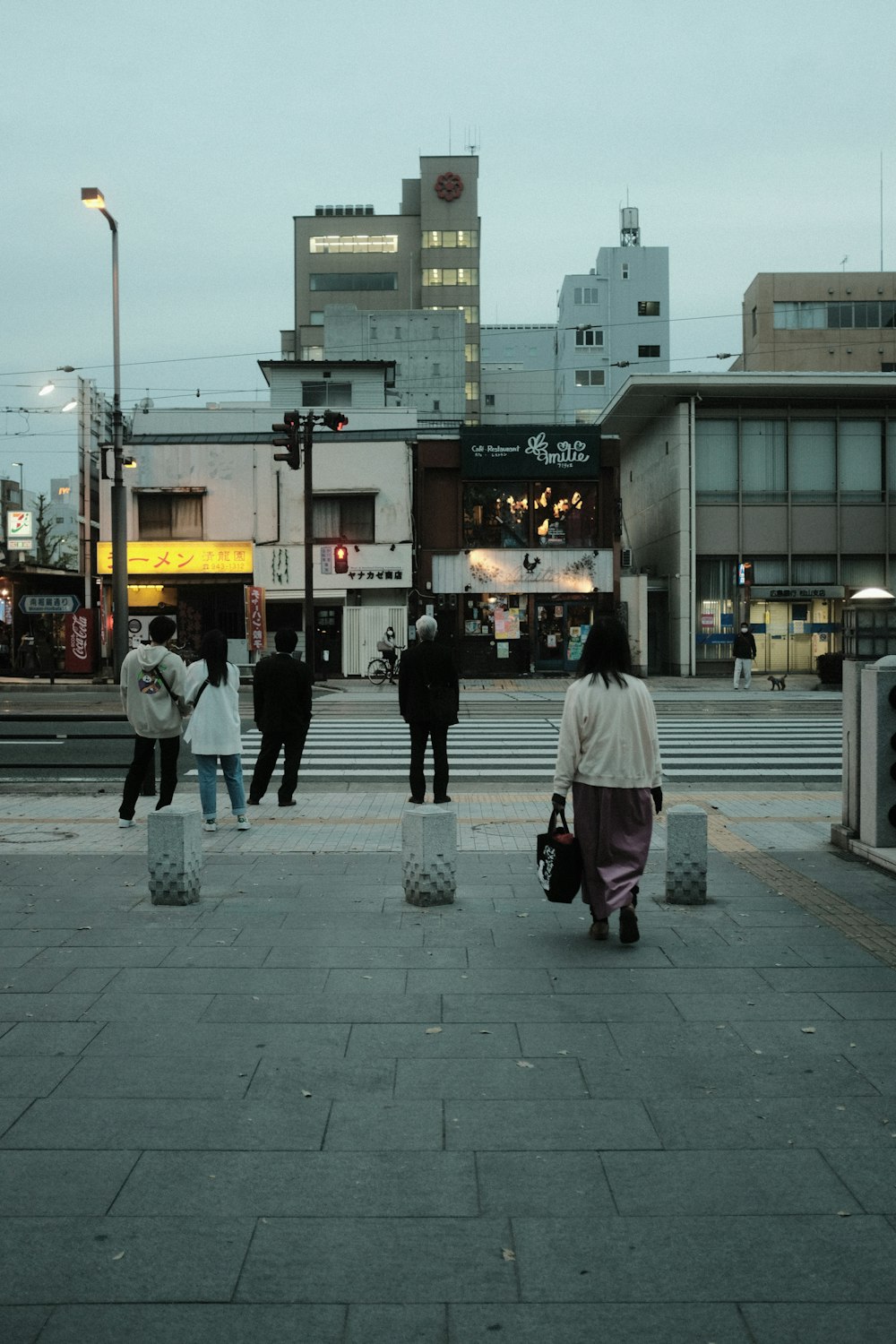 people walking on sidewalk during daytime