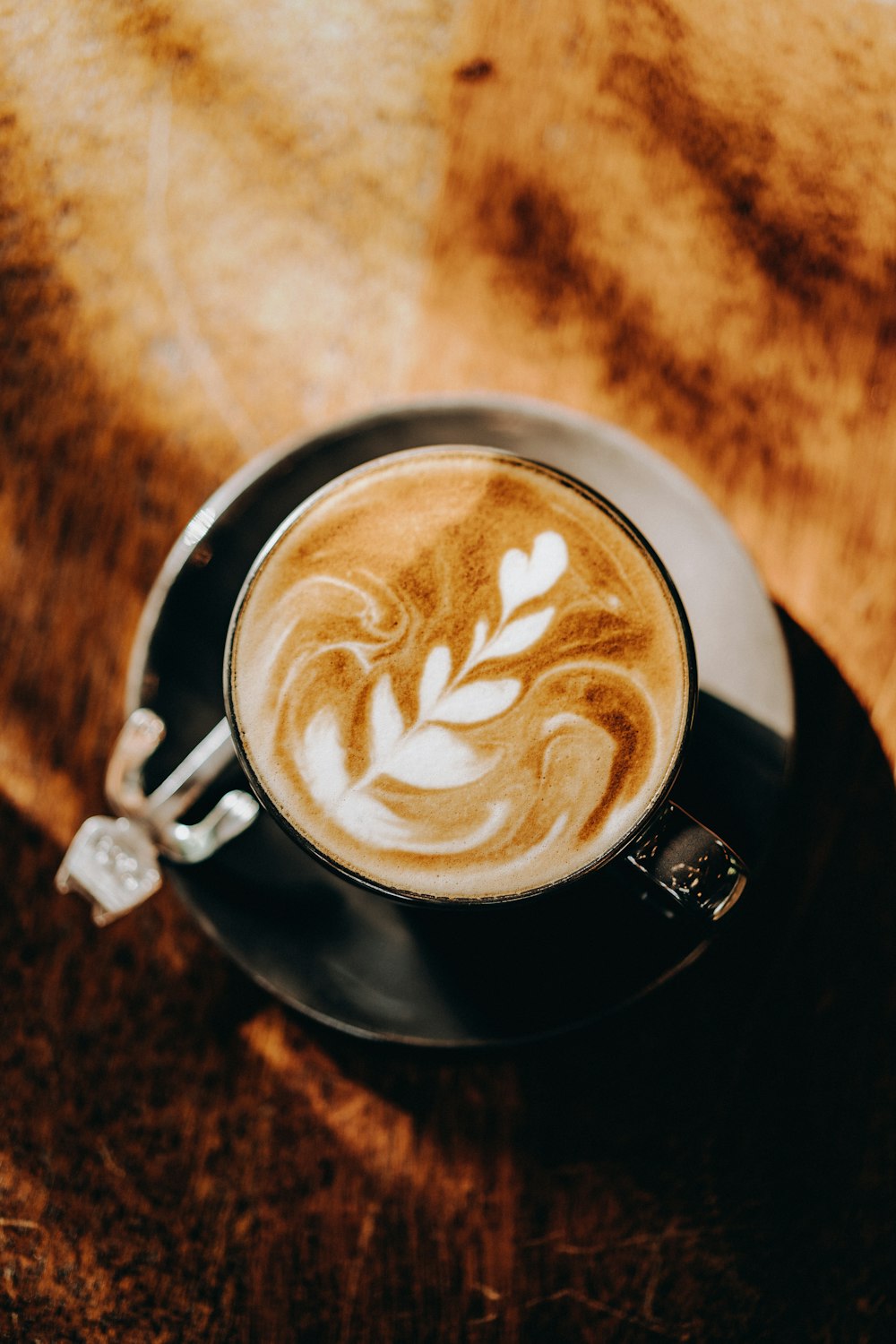 black ceramic mug with coffee