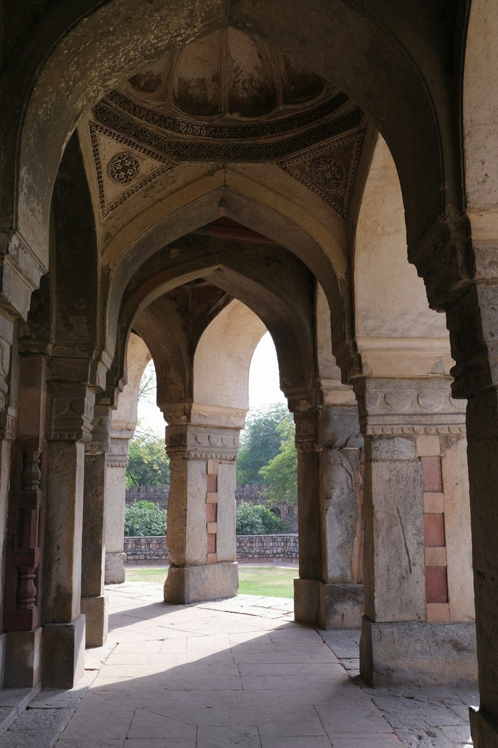 brown and beige concrete arch