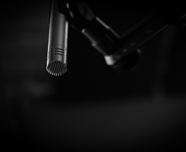 black and gray microphone on black background