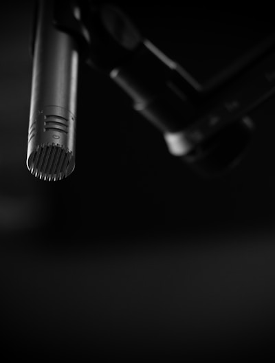 black and gray microphone on black background