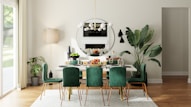 green and white wooden dining table and chairs