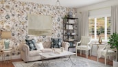 A cozy living room featuring freshly painted walls and stylish decor, highlighting our interior services.