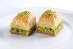 two brown bread on white ceramic plate