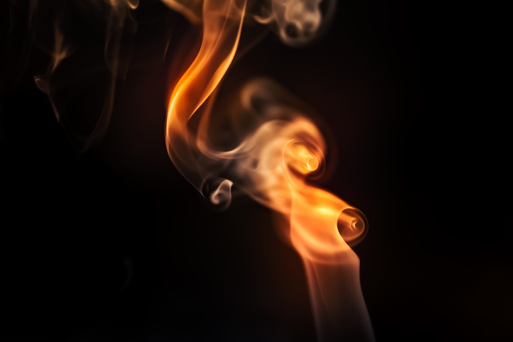 white smoke in black background