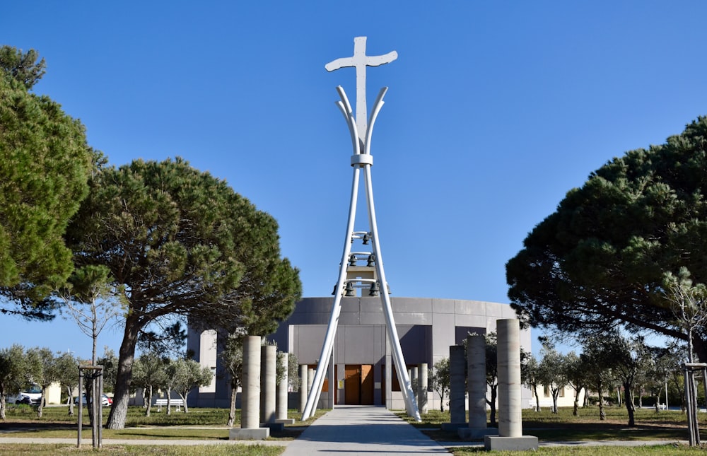 white cross on gray concrete building during daytime