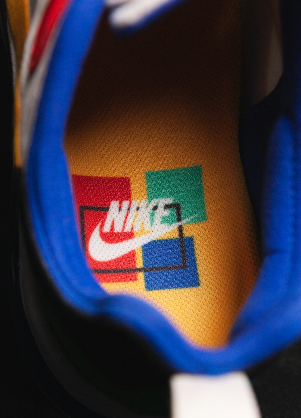 a close up of the nike logo on a shoe