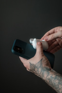 person holding white ceramic mug