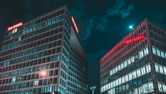 Photo of the Suttner GmbH office building at Alkenbrede 1, bathed in morning light.