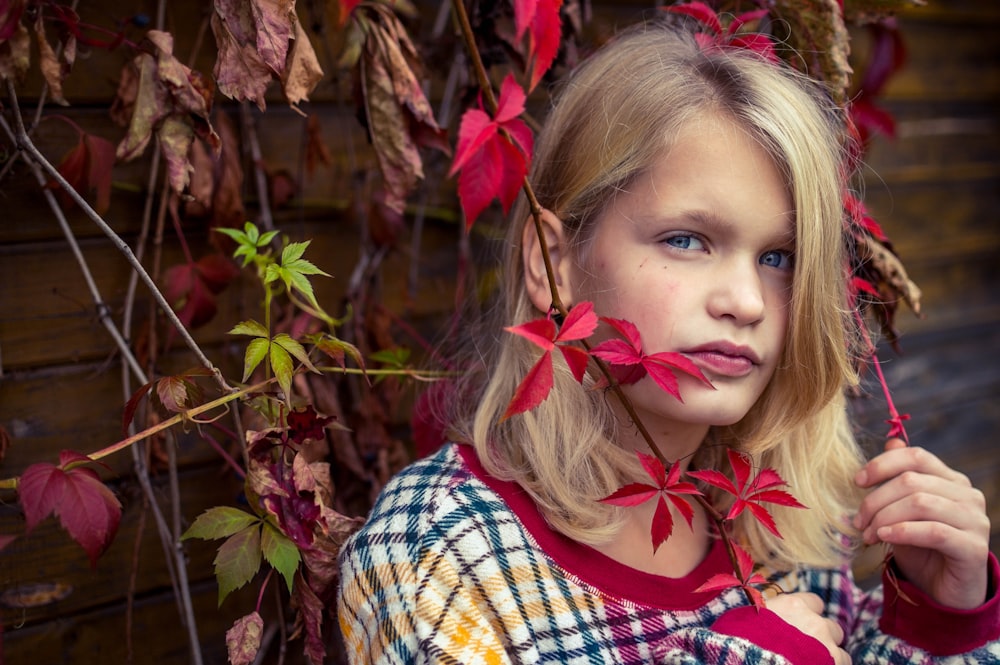 girl in red white and blue plaid shirt