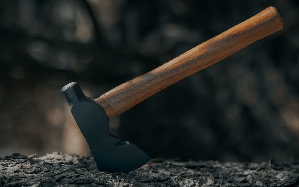 brown wooden handle on brown wooden stick