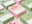 green and pink cardboard boxes