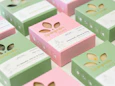 green and pink cardboard boxes