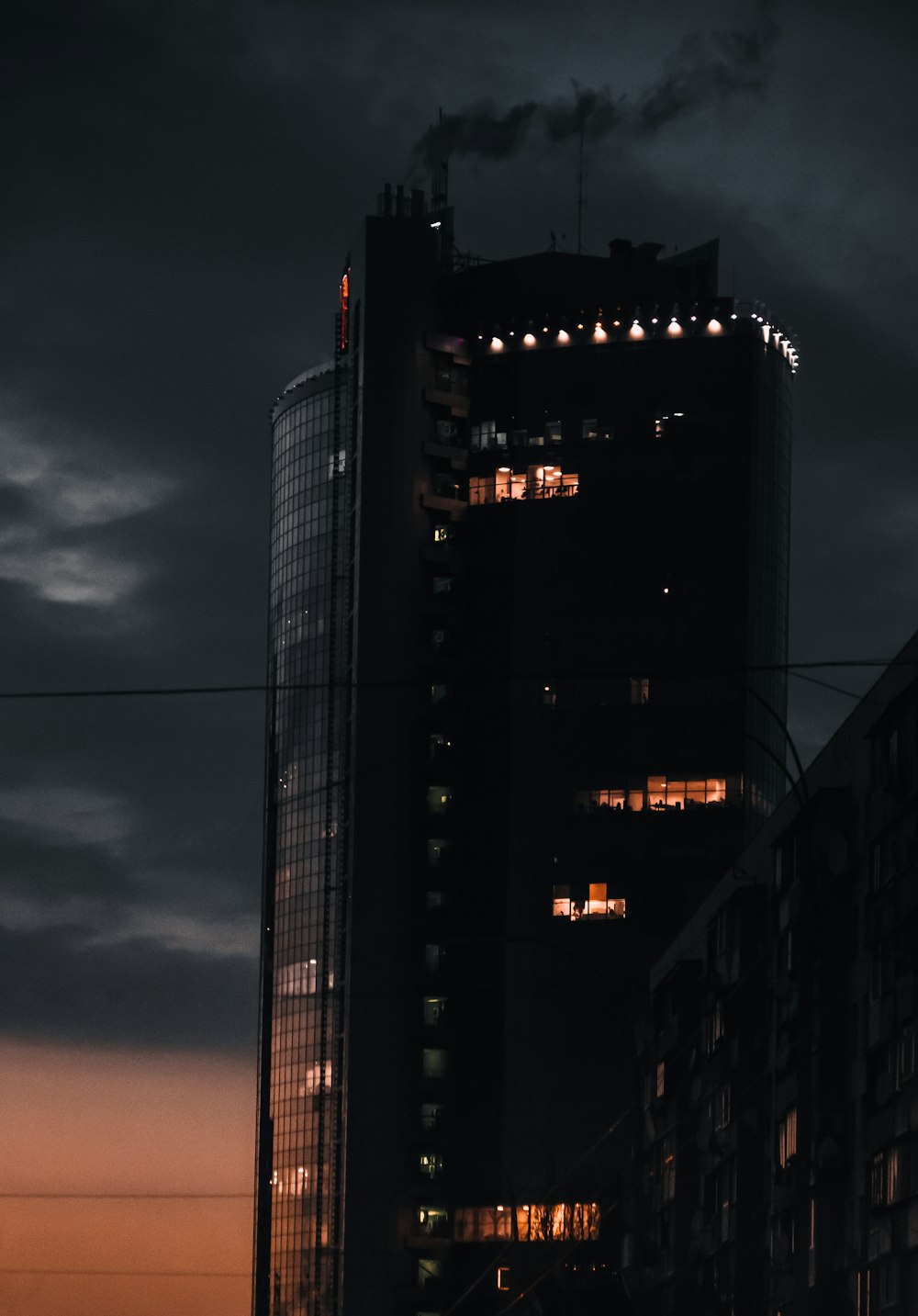 black and gray concrete building during night time