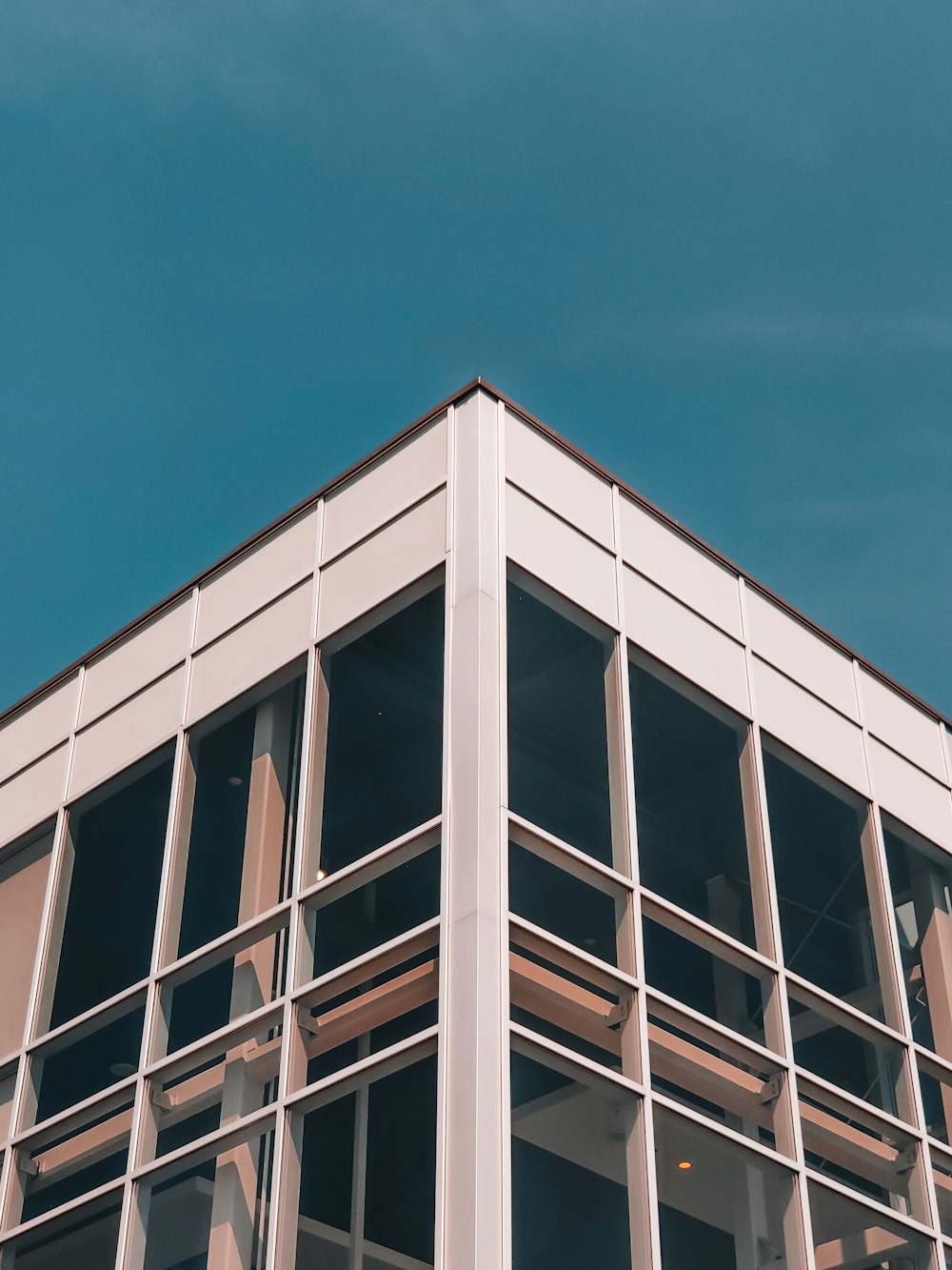 white concrete building under blue sky during daytime