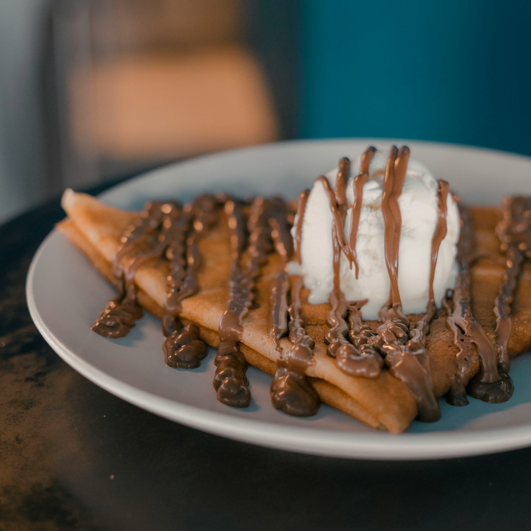 chocolate ice cream on white ceramic plate