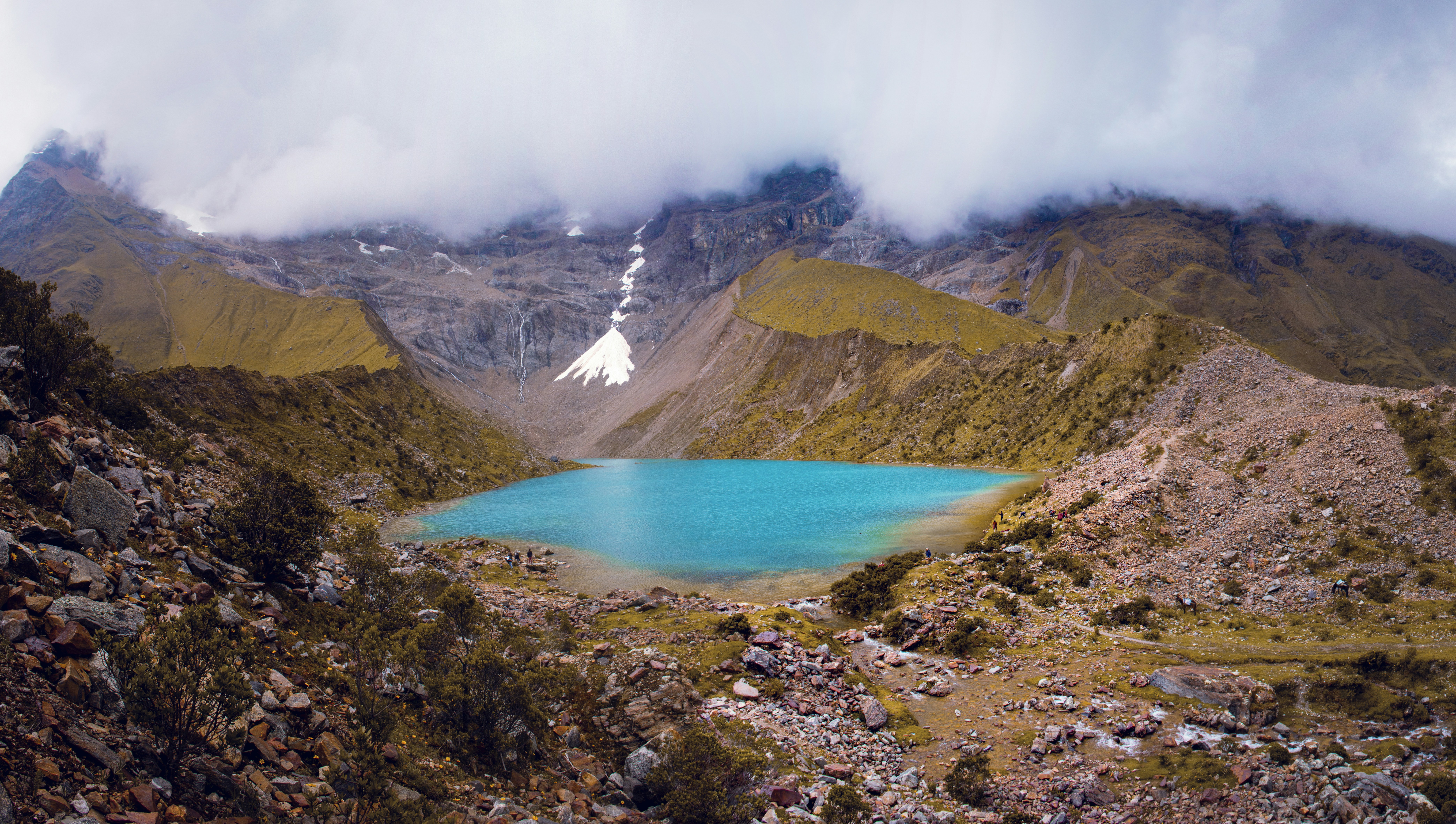 lake in the middle of mountains