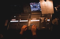 persons foot on audio mixer
