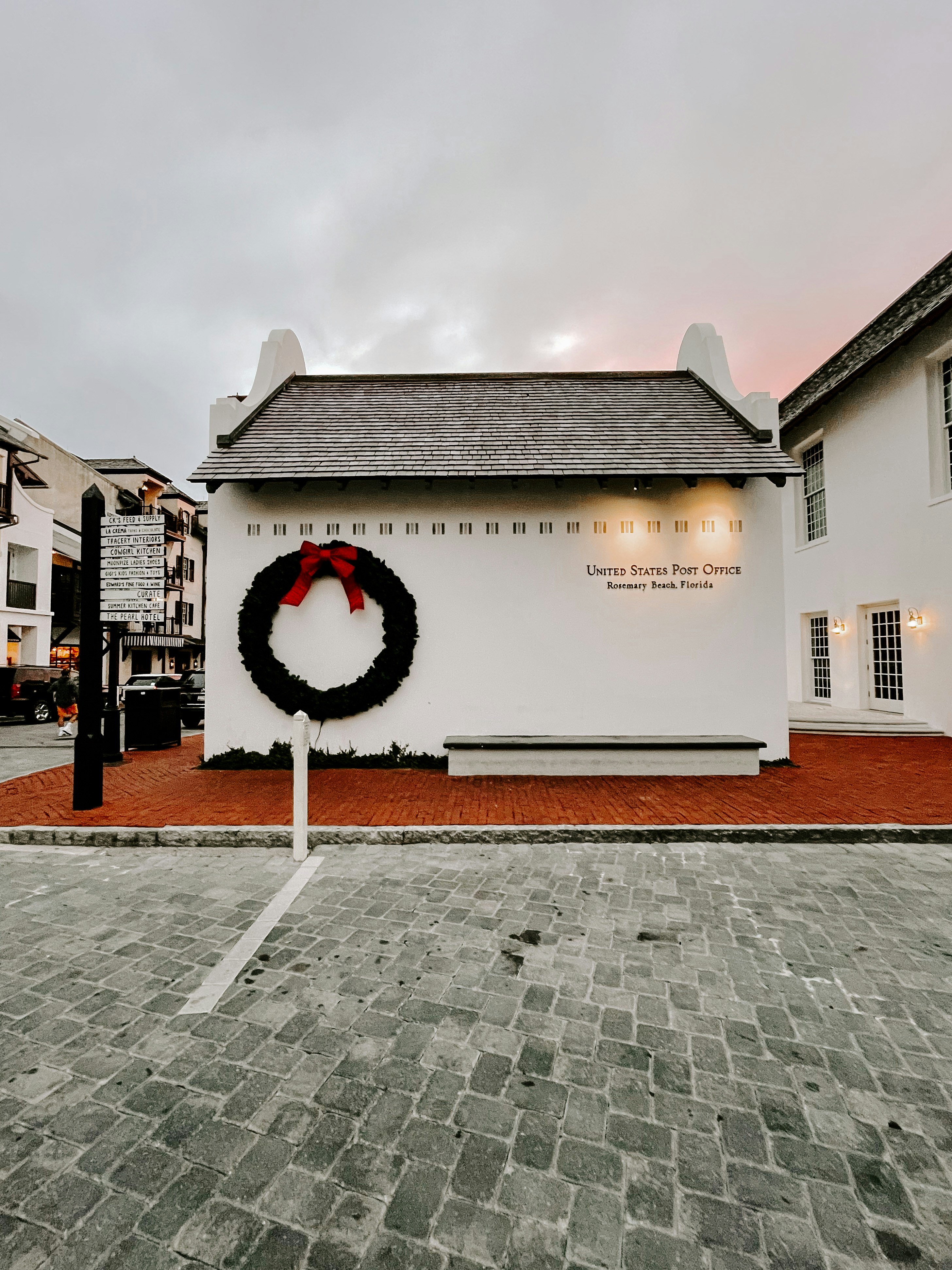 white and brown concrete building under white sky during daytime