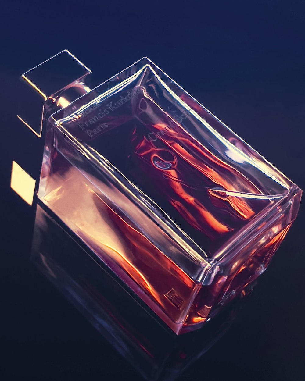 red and gold perfume bottle