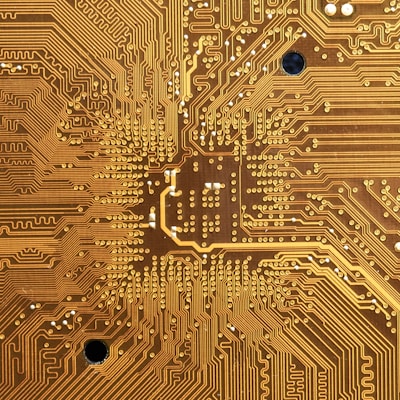 A close-up of a secure network circuit board with digital patterns and glowing connections.