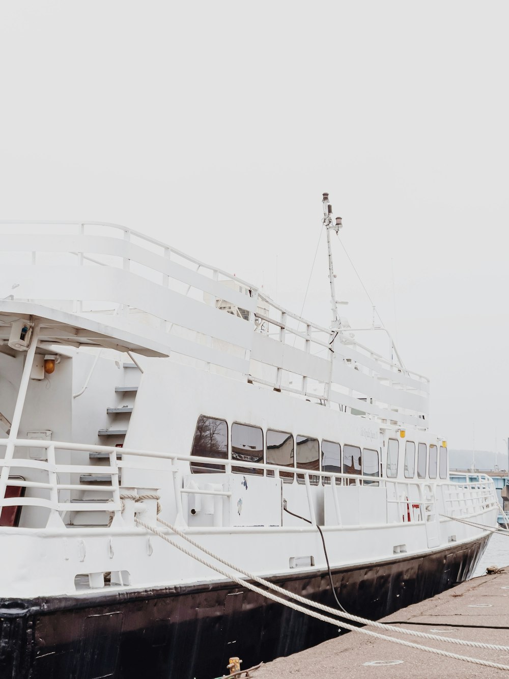 white ship on sea during daytime