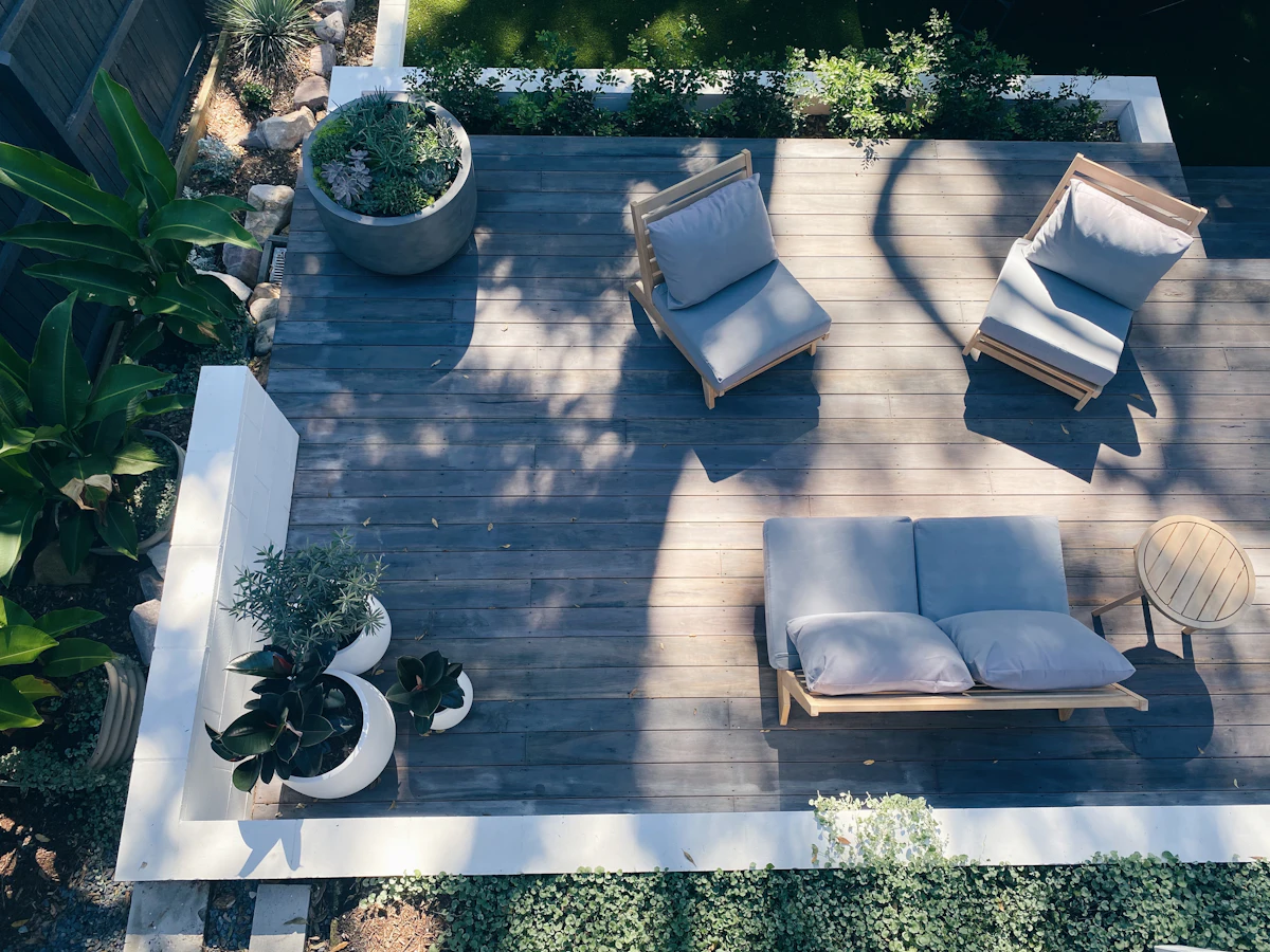 Finished hardwood deck with outdoor furniture