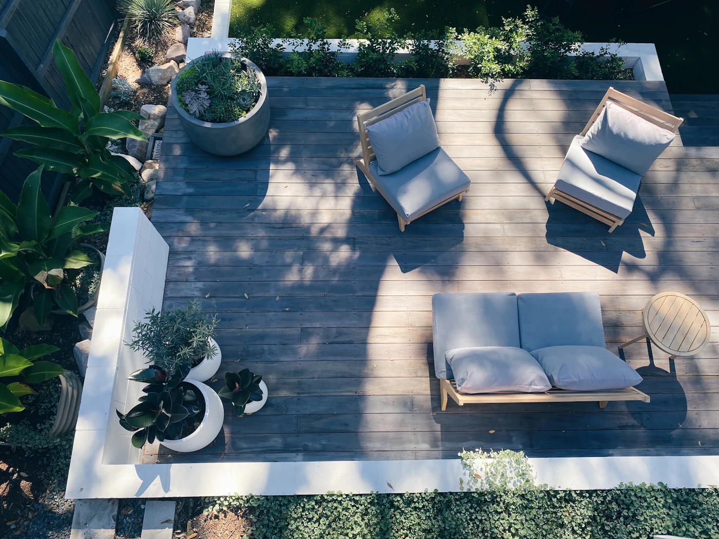 Aerial view of a finished timber deck with outdoor furniture