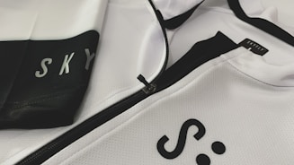 Close-up of a Sekille sports jacket showing detailed stitching and the brand’s signature logo.