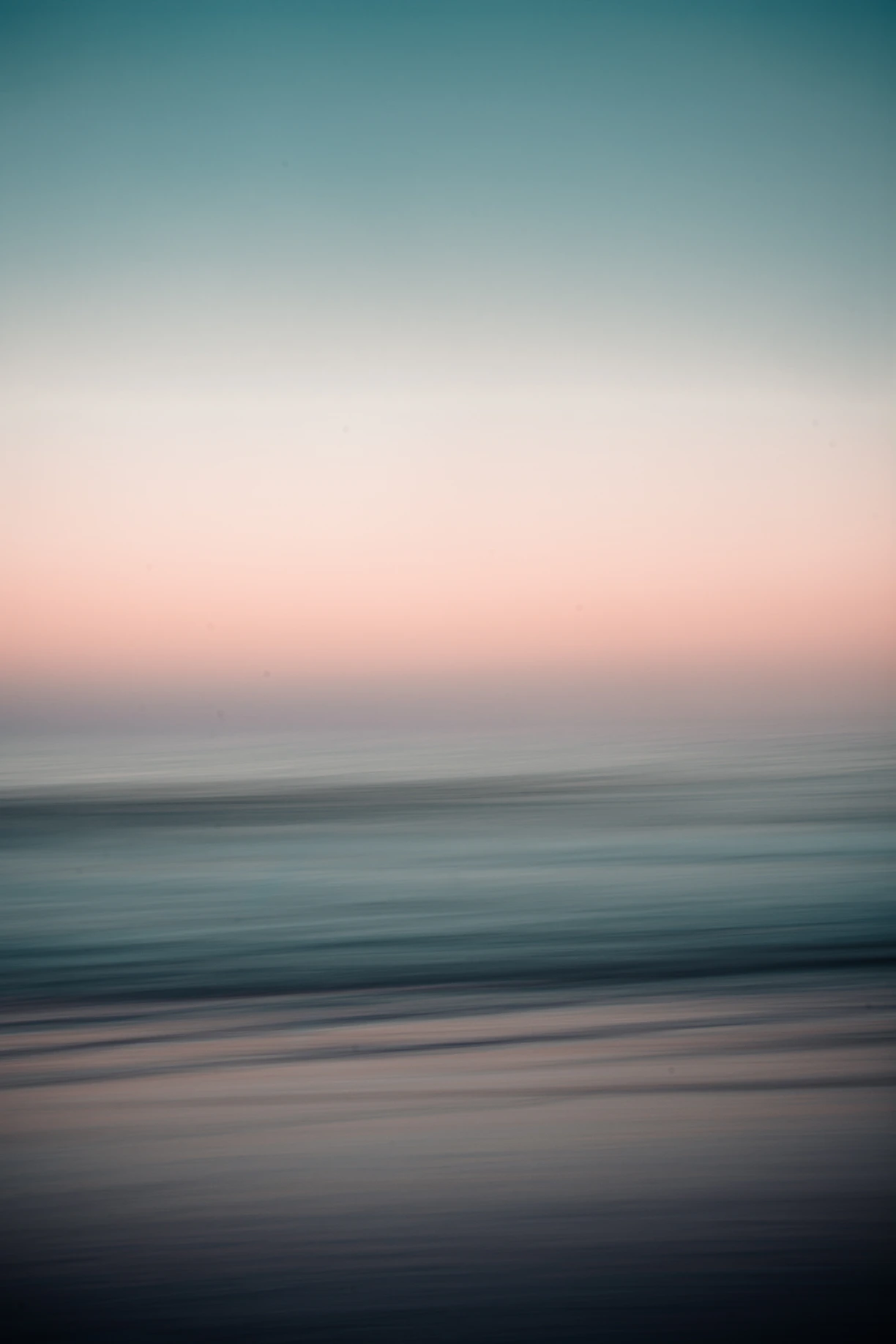body of water under cloudy sky during daytime