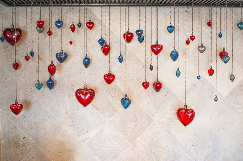 red and silver baubles on white textile