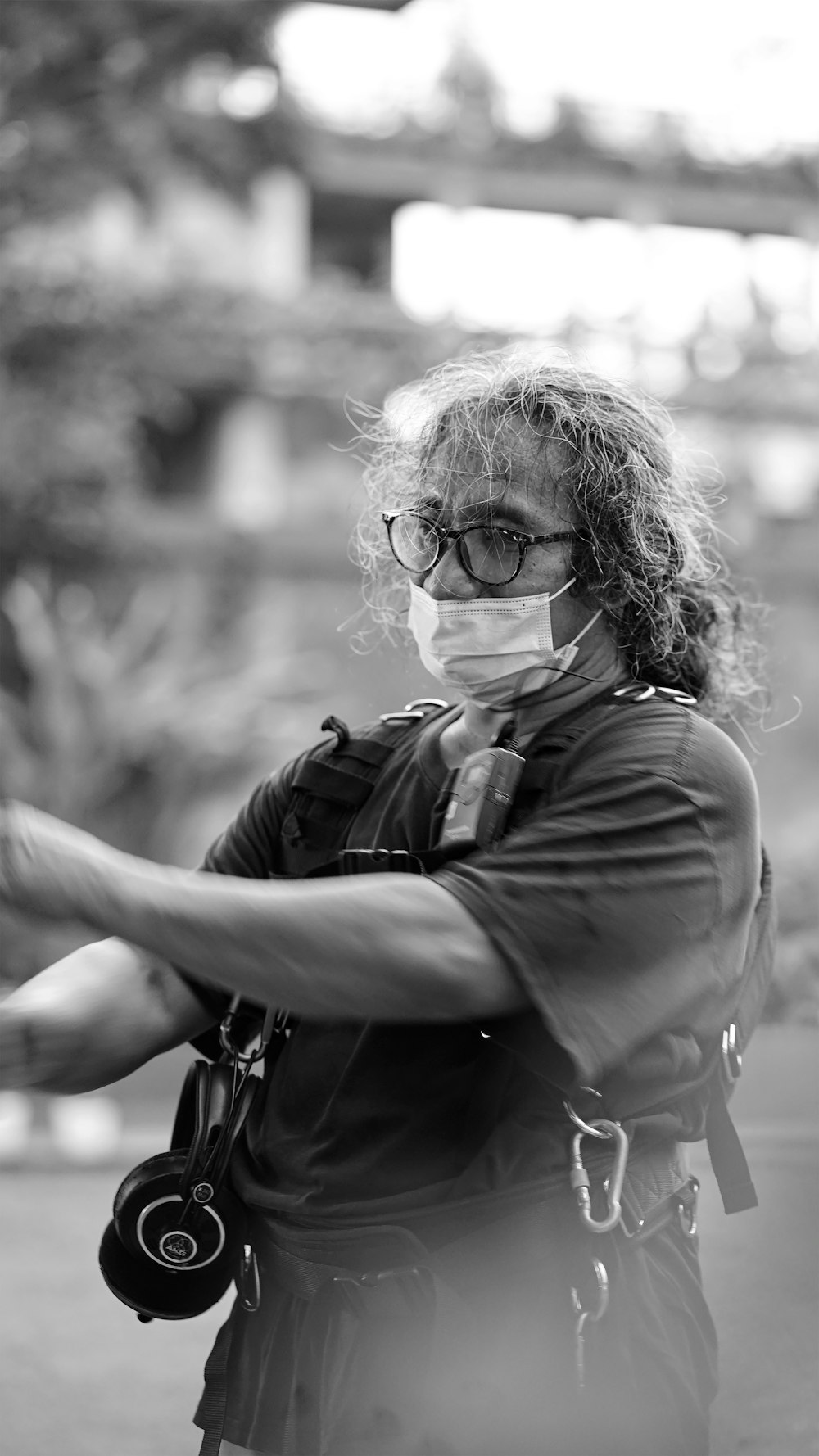 woman in black leather jacket wearing black framed eyeglasses