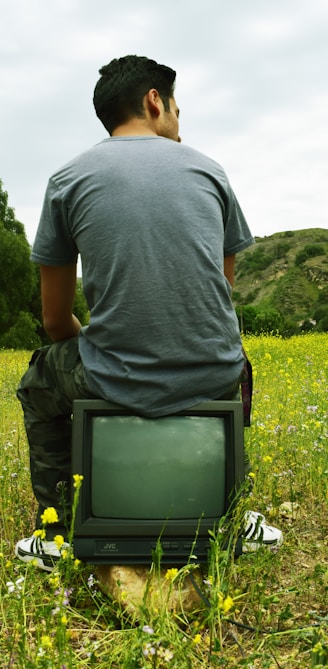 man in gray shirt that says premium digital marketing