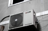 white and gray box fan