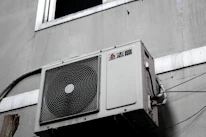 white and gray box fan