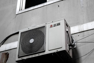 white and gray box fan