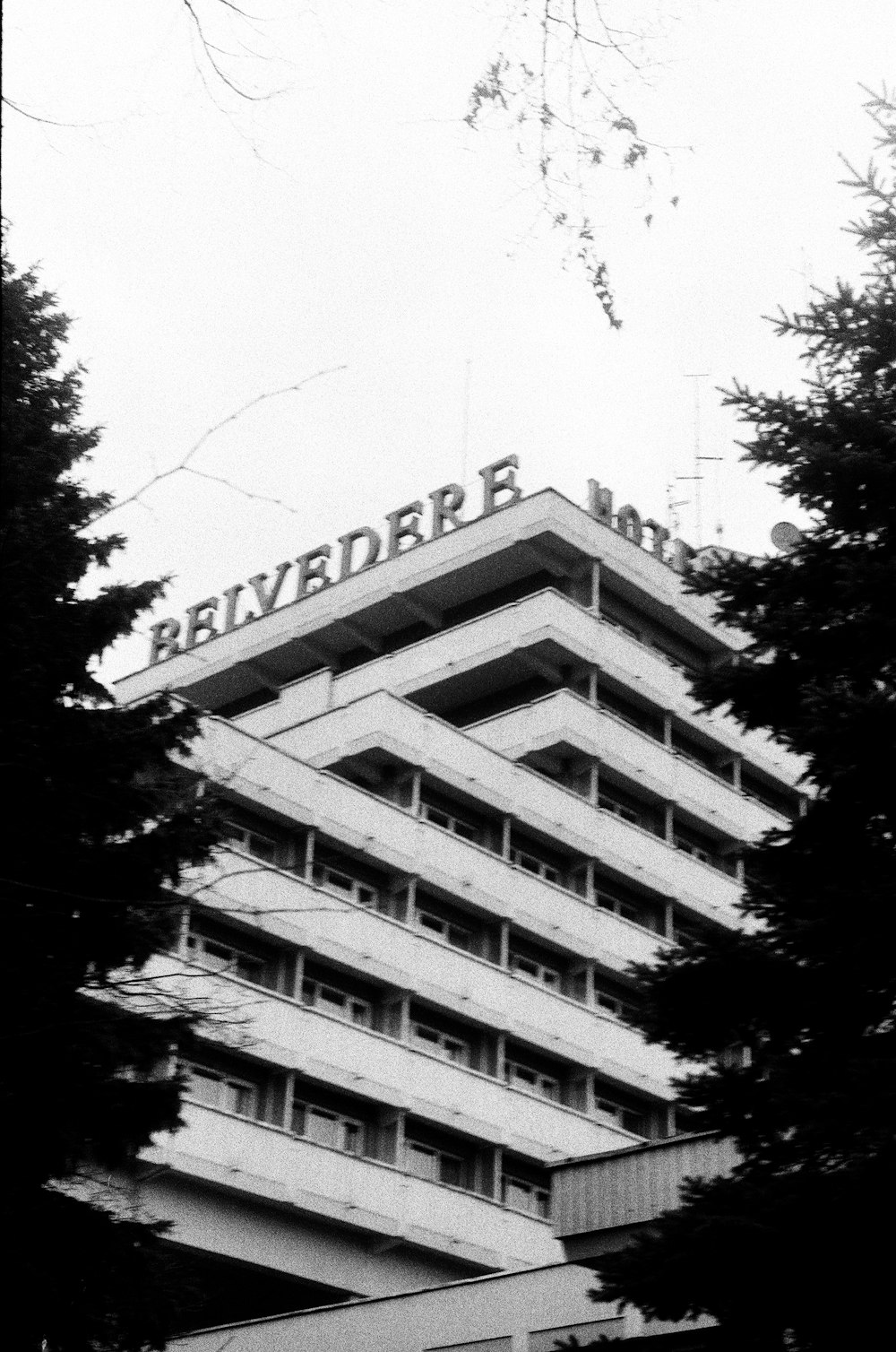 a black and white photo of a tall building