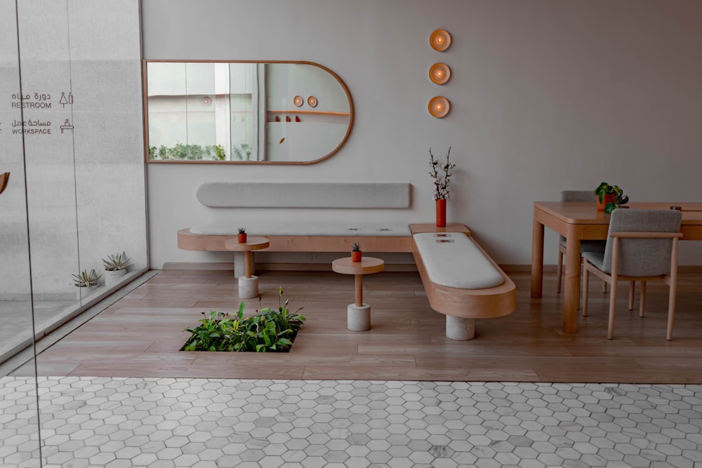 brown wooden table near white wooden bench