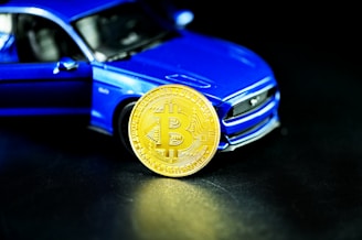 blue car with gold round coin