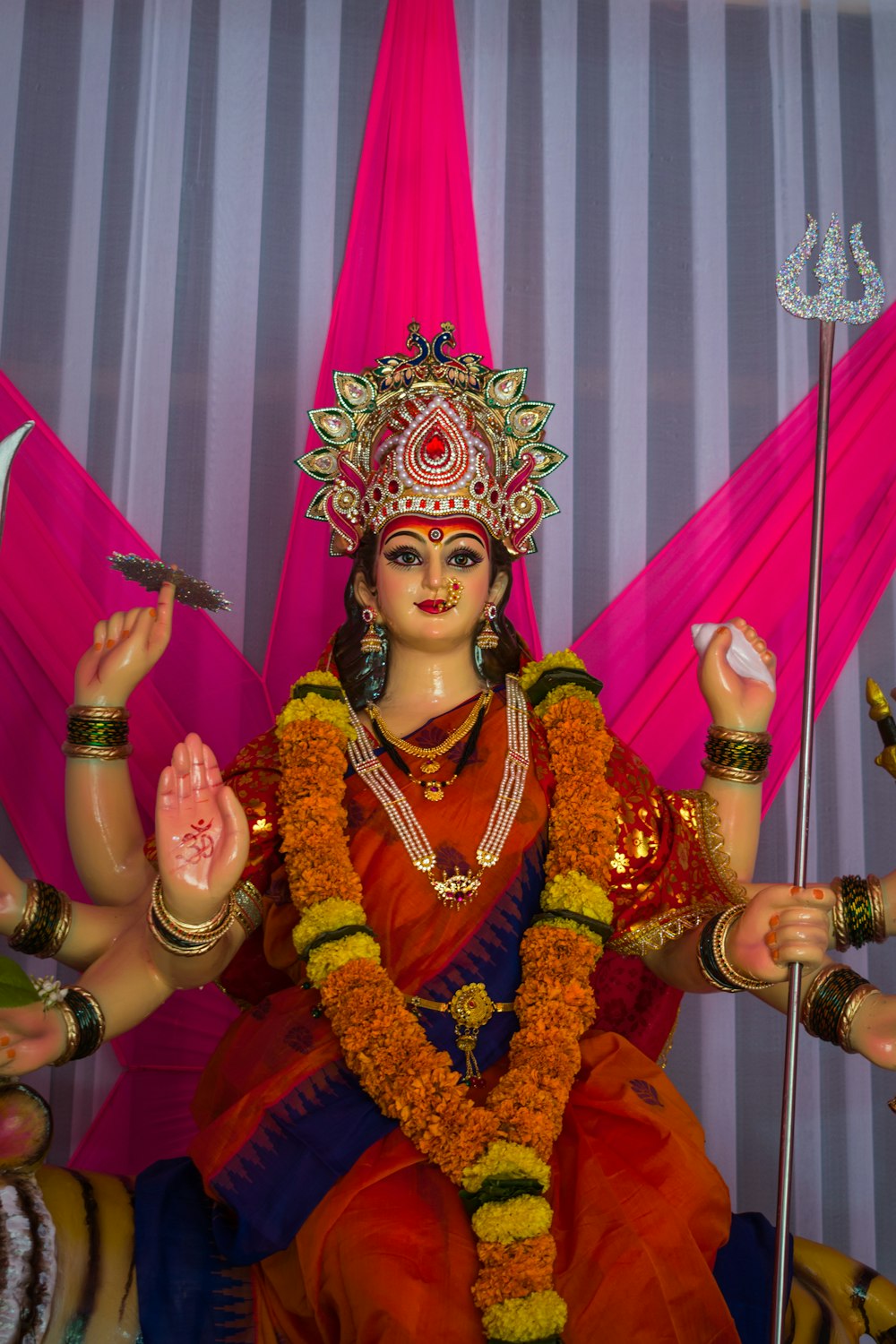 woman in red and gold traditional dress