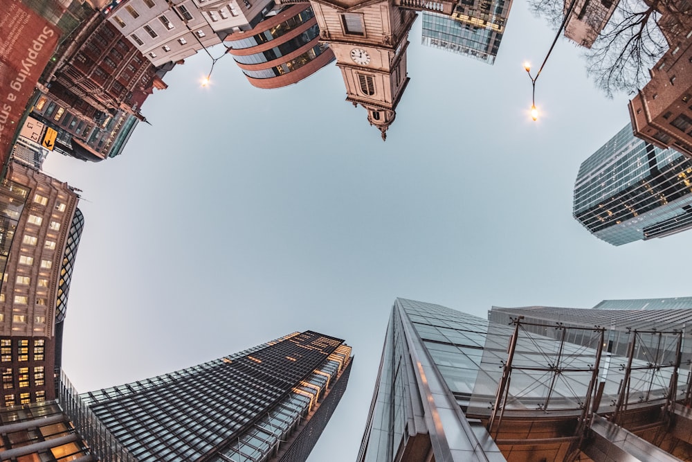 low angle photography of high rise buildings