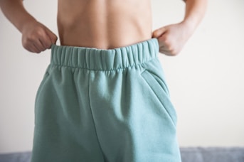 topless woman in green skirt