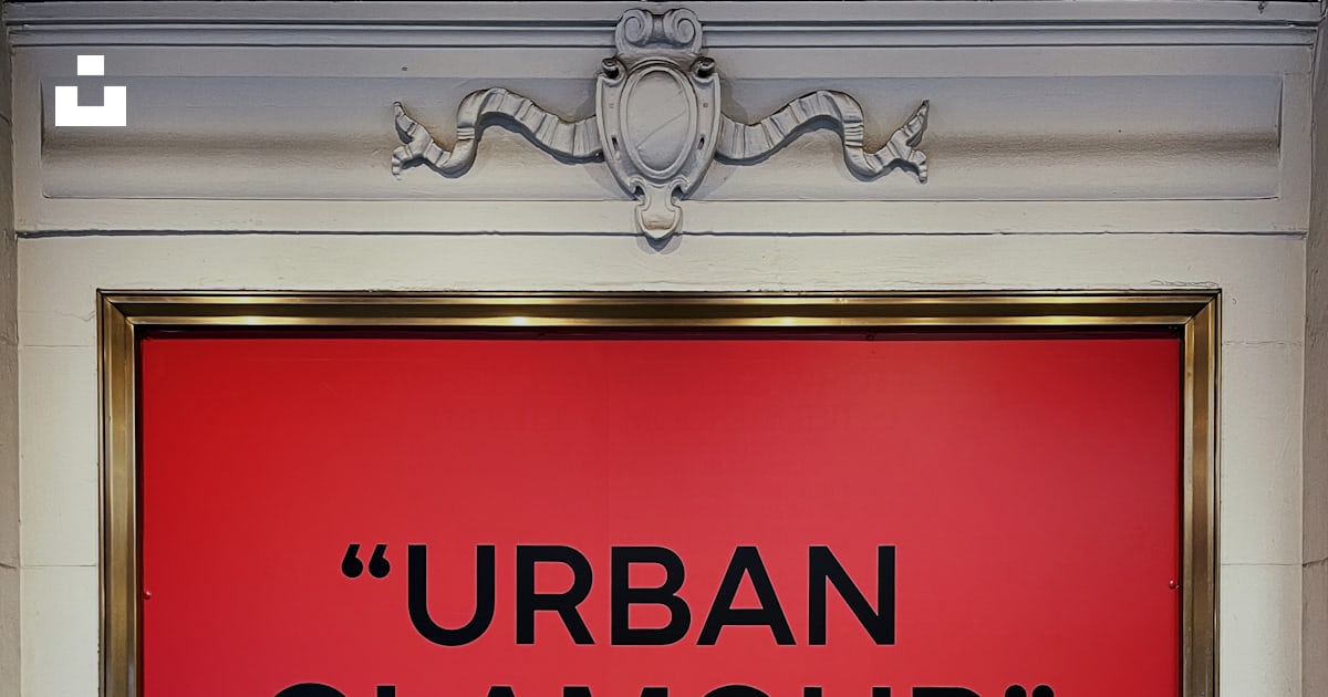 A large red sign that says urban glamour photo – Free Red Image on Unsplash