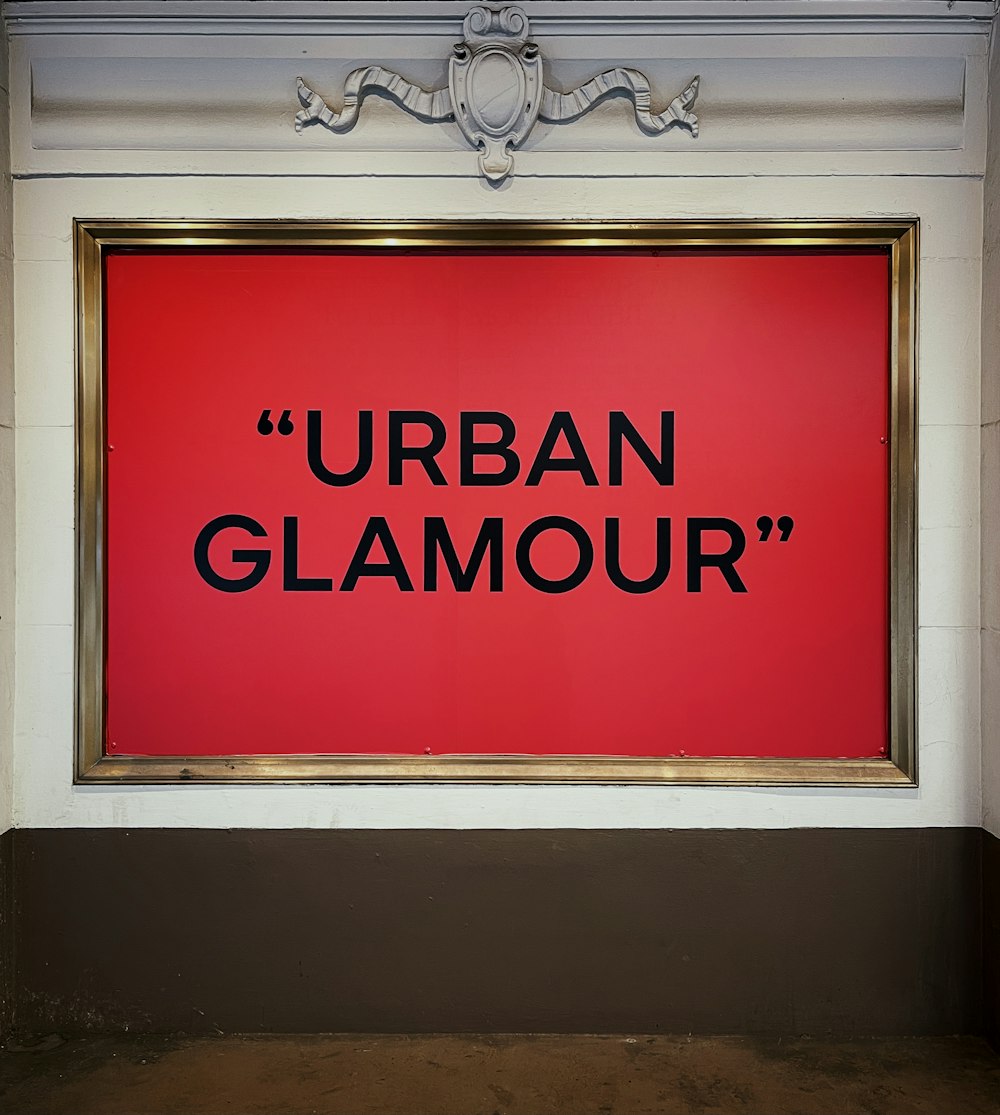 a large red sign that says urban glamour