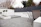 Image of a modern concrete patio with clean lines and comfortable outdoor seating.