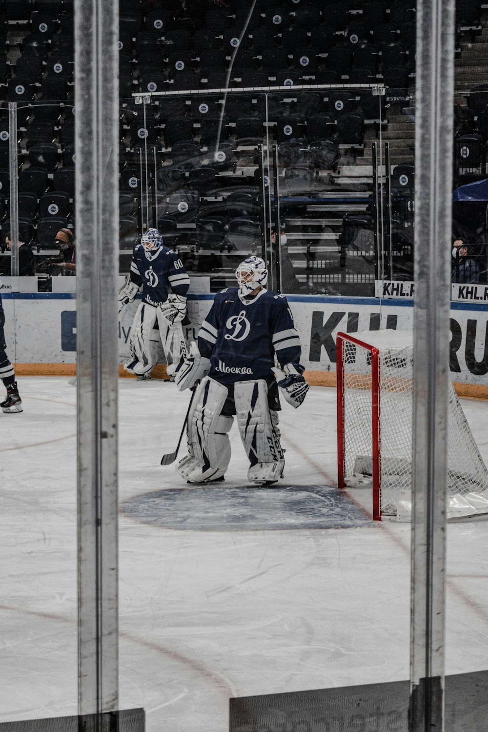 man in blue and white ice hockey jersey