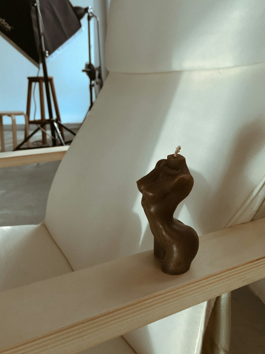 brown wooden animal figurine on white table