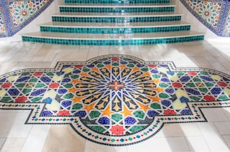 black white and brown floral rug
