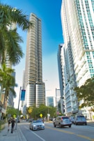A bustling Dubai financial district street with modern skyscrapers and busy professionals.